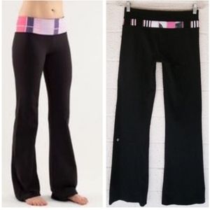 Black Lululemon Groove Pants with pink band